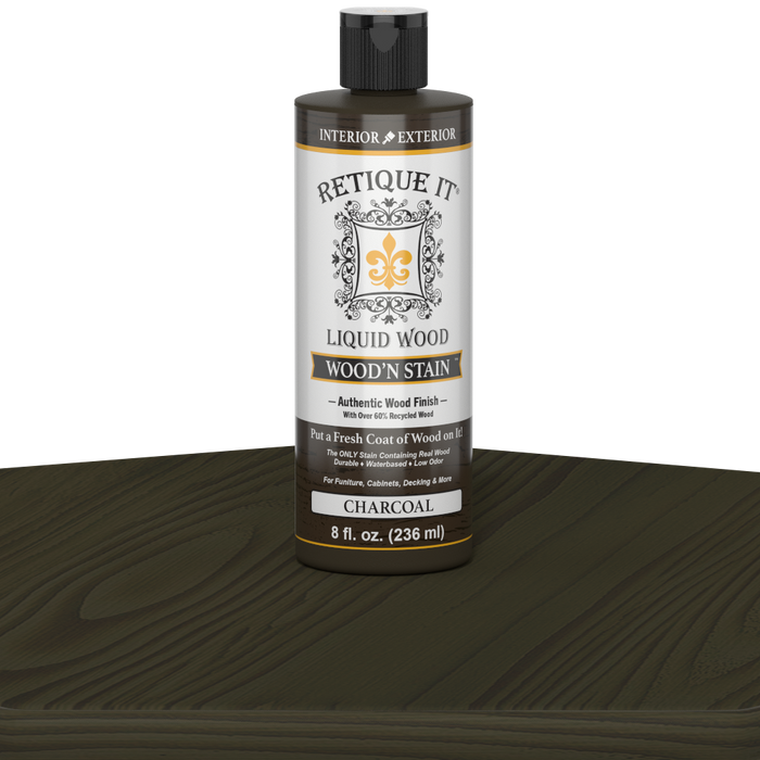 Retique It Liquid Wood Wood'n Stain in 8 oz Charcoal, showcasing the dark, rich stain applied to wood for a deep charcoal finish.