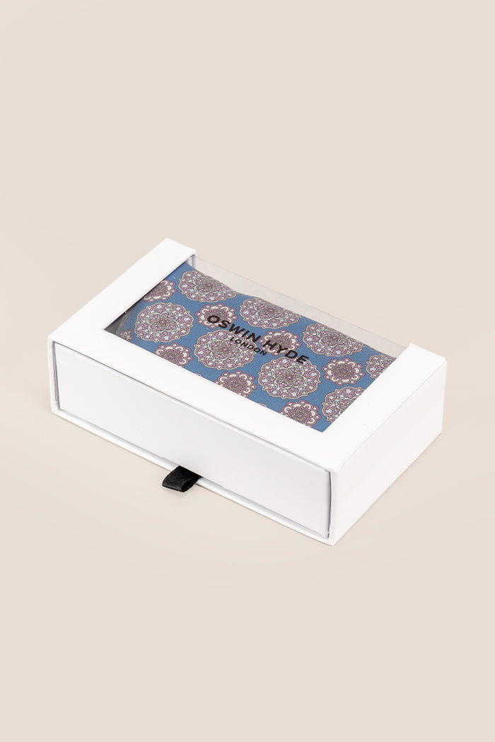 Men’s blue silk handkerchief with an intricate geometric pattern, perfect for weddings, formal occasions, or sophisticated smart dressing.