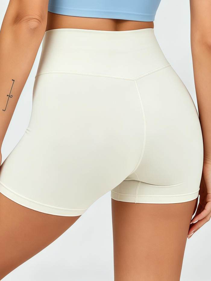 Cross-Front Strappy Sports Bra & Cream High-Waisted Biker Short Set