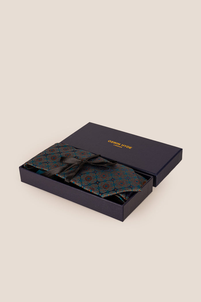 Elliot Turquoise tie with floral pattern, ideal for weddings, parties, and formal occasions.