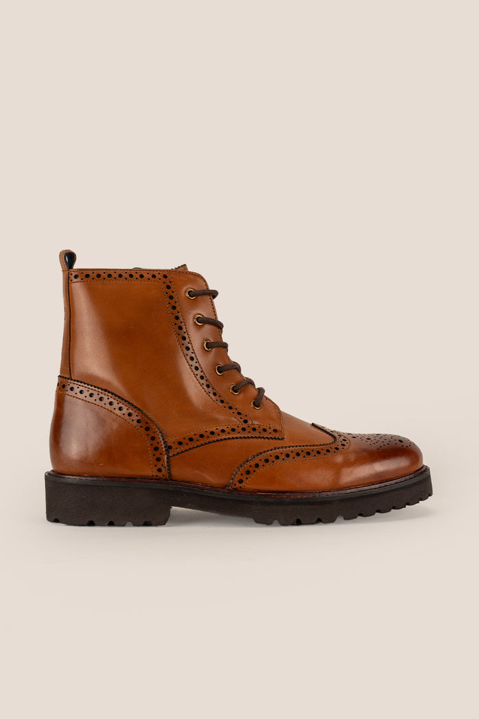 Graham tan leather brogue boots for men with classic perforated detailing, ideal for dressy and smart-casual occasions.