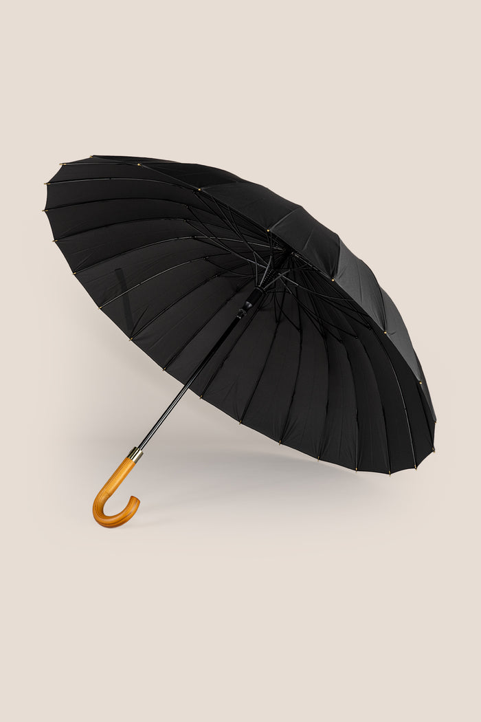 Joseph Black men’s windproof umbrella featuring a wooden J-handle, combining classic elegance and reliable durability for all-weather protection.