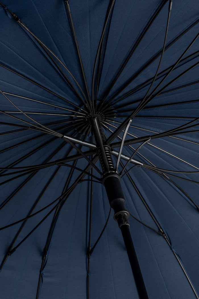 Joseph Blue men’s windproof umbrella with wooden J-handle, blending classic design with reliable durability for refined all-weather protection.