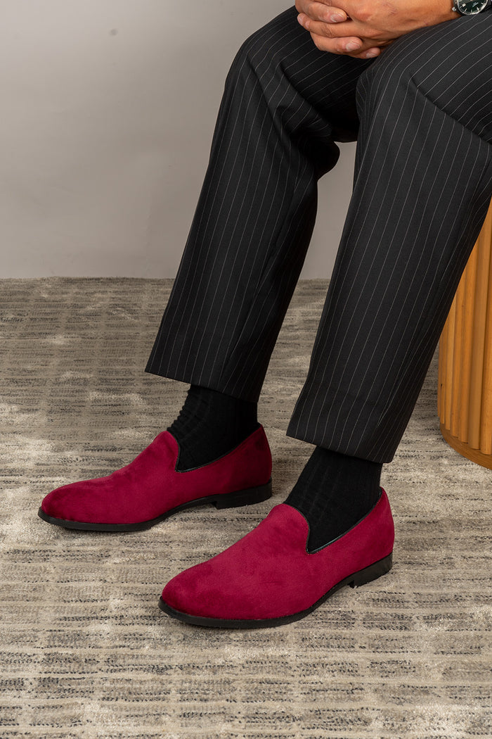 Model wearing Lennox bordo velvet loafers for men featuring rich velvet texture, elegant design, and a sophisticated silhouette perfect for formal or smart-casual wear.