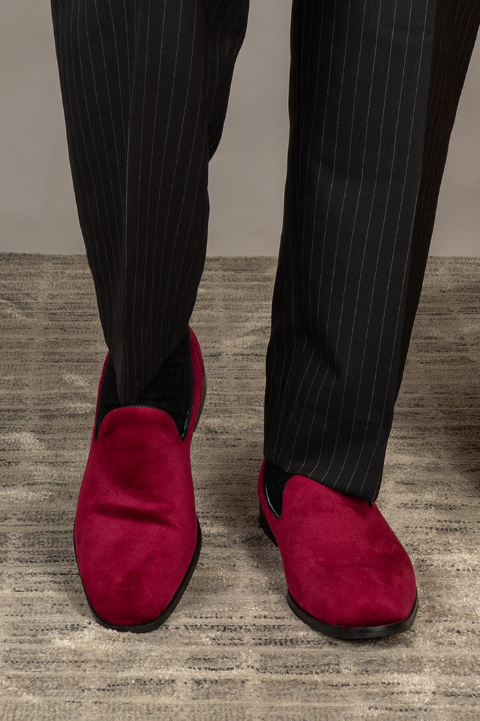 Model wearing Lennox bordo velvet loafers for men featuring rich velvet texture, elegant design, and a sophisticated silhouette perfect for formal or smart-casual wear.