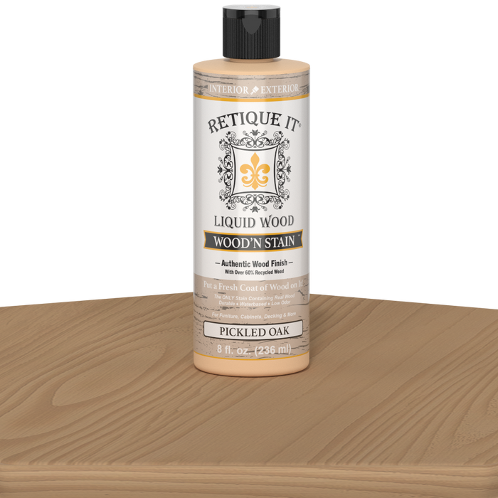 Retique It Liquid Wood Wood'n Stain in Pickled Oak, 8 oz jar, showcasing the stain's light oak color and smooth application.