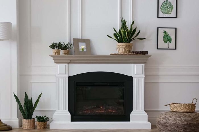 Retique It Multi-purpose Smooth Finish Kit in Harbor Gray for exterior wood surfaces, shown on a fireplace mantle.