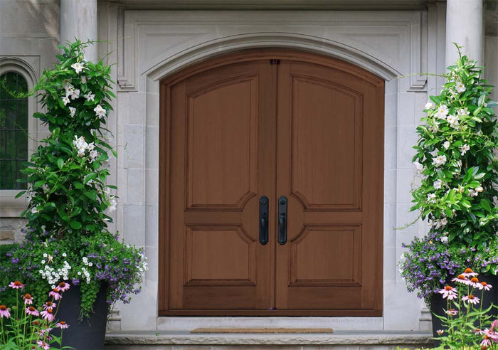 Retique It wood finish kit with Java exterior top coat, smooth matte finish on a double front door, for a polished look.