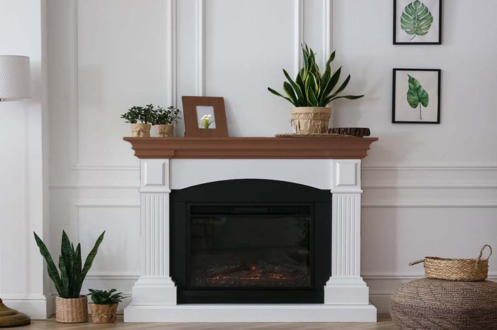 Retique It Multi-purpose Smooth Finish Kit in Java for interior wood finishing, displayed on a fireplace mantle.