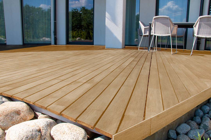 Retique It Multi-purpose Smooth Finish Kit (Large) in Pecan for wood decking, showing a neatly finished wooden surface.