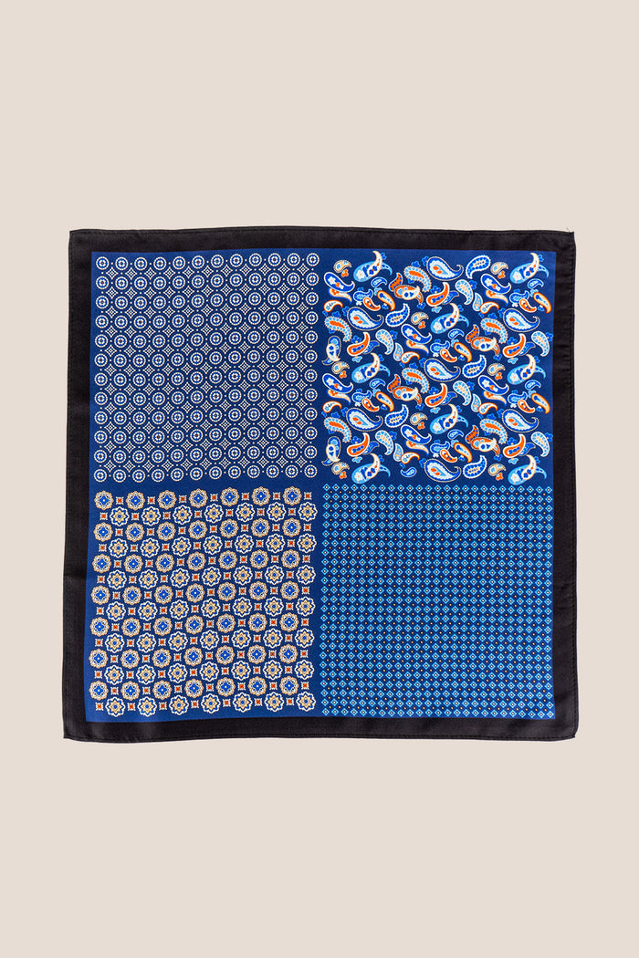 Men’s navy silk pocket square handkerchief with four versatile folds and intricate pattern, ideal for weddings, formal occasions, or smart casual wear.