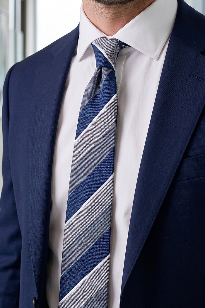 Percy Navy tie with classic striped design, perfect for weddings, parties, and formal occasions.