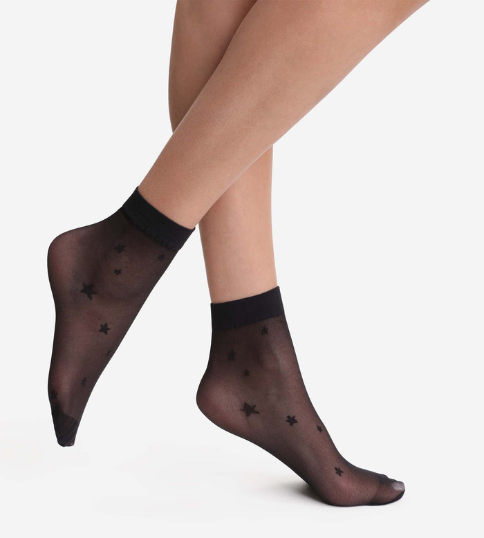 Socquettes transparentes noires à motif Etoiles Dim Style