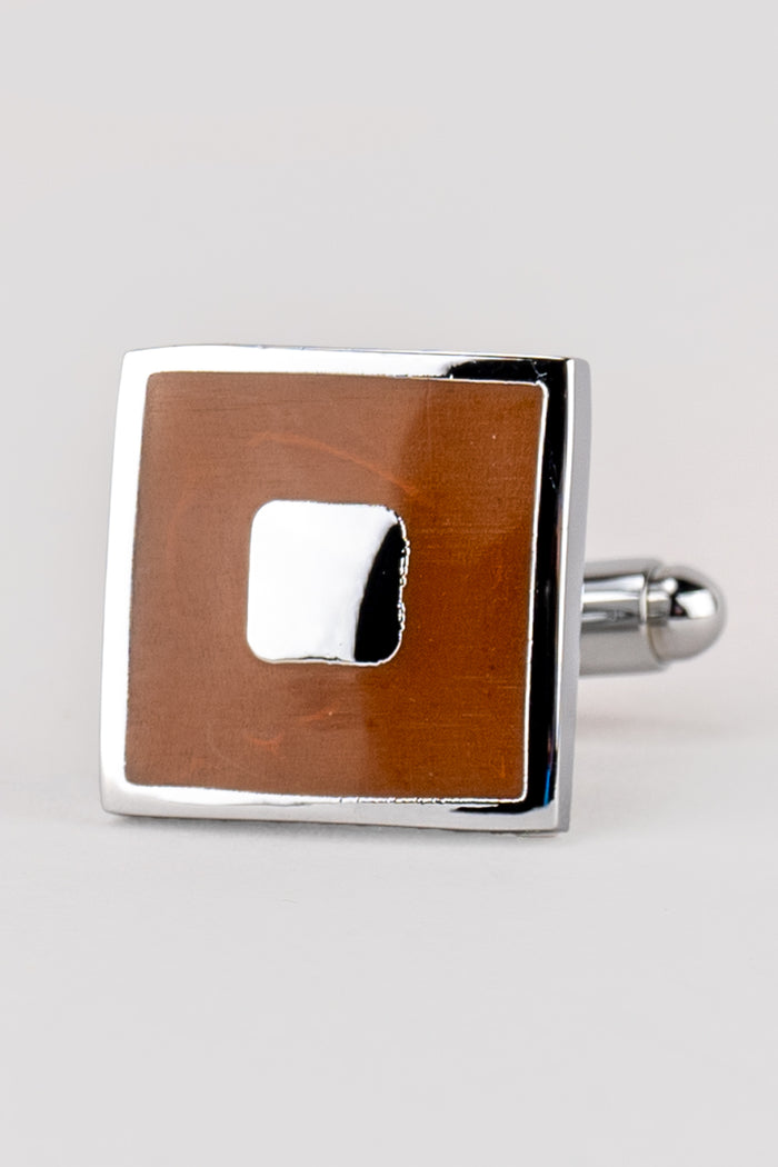 Square brown men’s cufflinks featuring rich enamel finish and intricate metal detailing, crafted for formal elegance and precision craftsmanship.