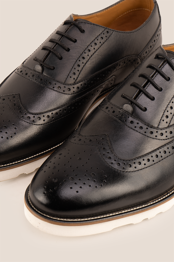 Tyler II black Oxford brogue leather shoes for men featuring detailed perforation, premium leather, and a classic formal silhouette.
