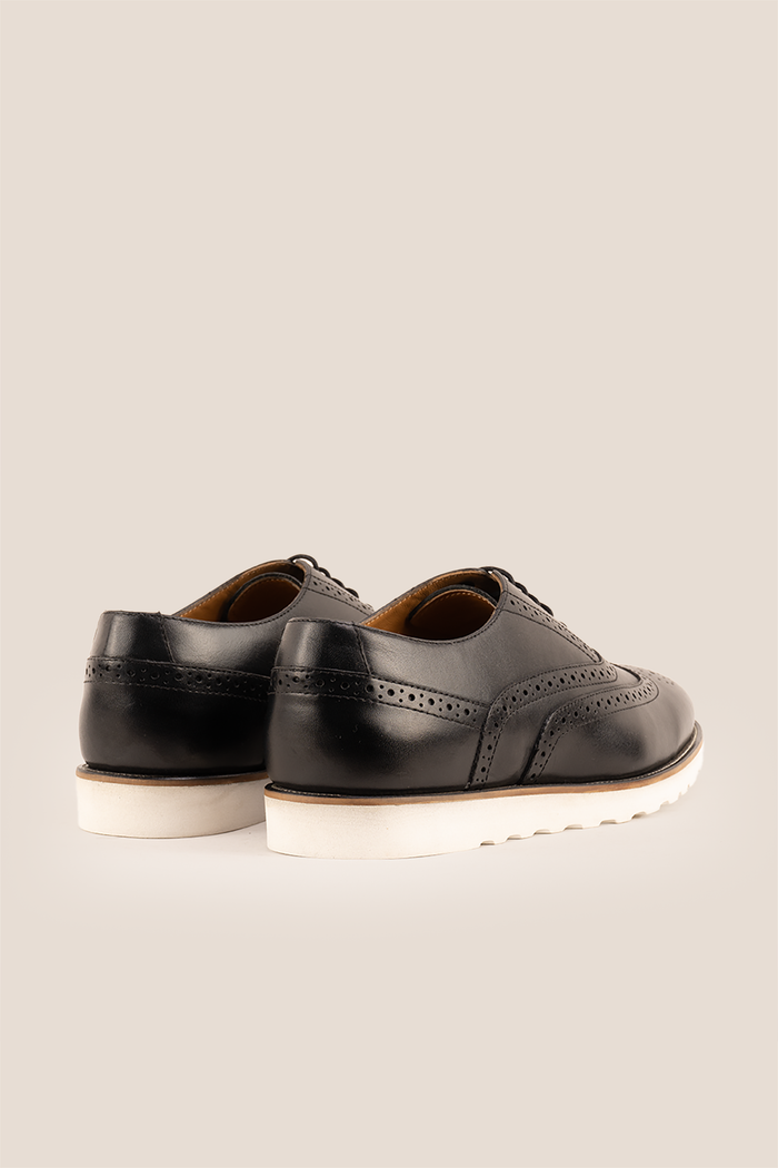 Tyler II black Oxford brogue leather shoes for men featuring detailed perforation, premium leather, and a classic formal silhouette.
