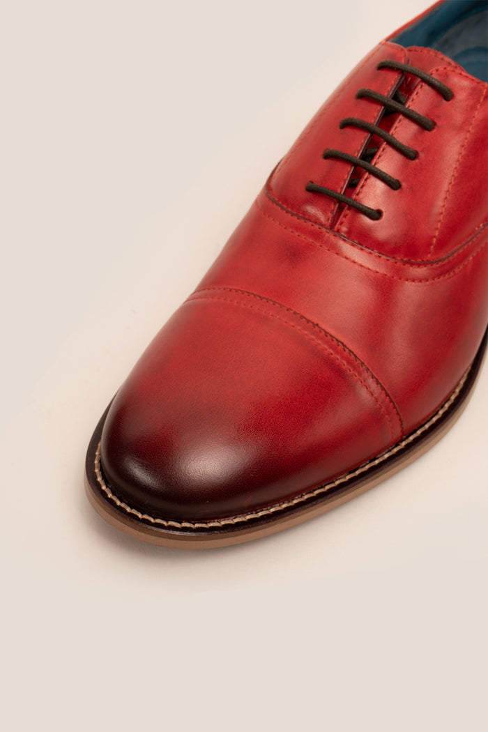 William cherry red leather oxford shoes for men by Oswin Hyde – elegant toecap lace-up design with polished leather and timeless sophistication.