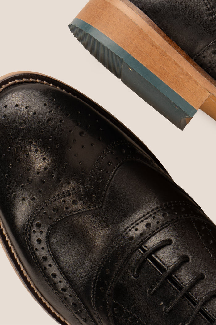 Winston Black Brogue Oxford leather shoes for men with classic perforated detailing and polished finish, ideal for formal and professional occasions.