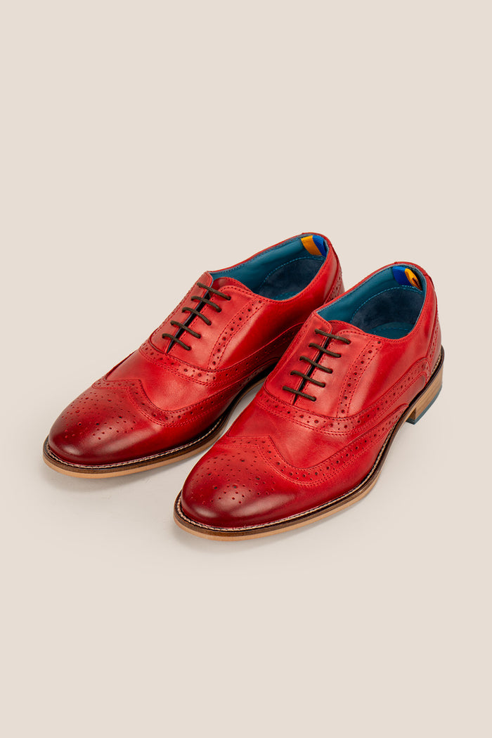 Winston cherry leather Oxford brogues for men featuring wingtip perforations and polished finish, ideal for formal and smart-casual occasions.