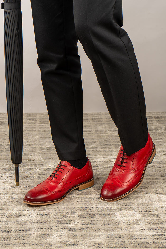 Winston cherry leather Oxford brogues for men featuring wingtip perforations and polished finish, ideal for formal and smart-casual occasions.