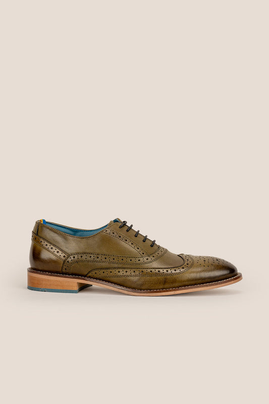Winston men’s Oxford brogue shoes in green leather with wingtip detail, perforated accents, and a classic lace-up silhouette—crafted for formal distinction.