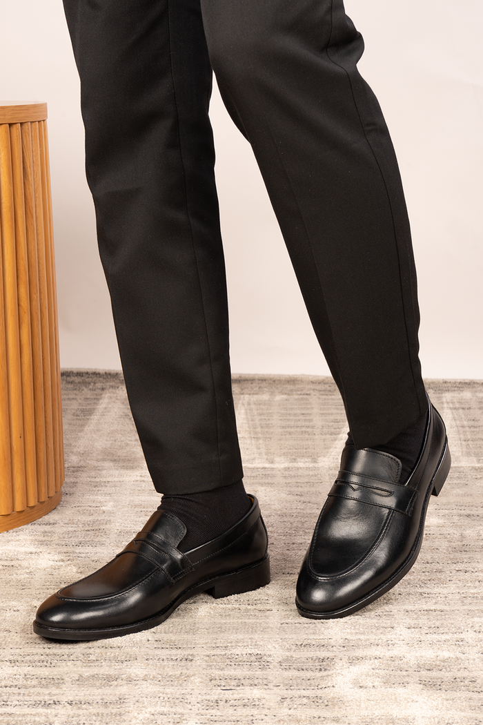 Wyatt Black men’s leather loafer made from high-quality crust leather with classic design, ideal for smart casual and formal wear.